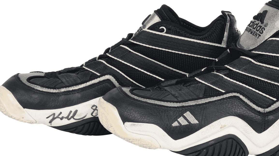 Cover Image for Kobe Bryant shoes from first NBA start up for auction