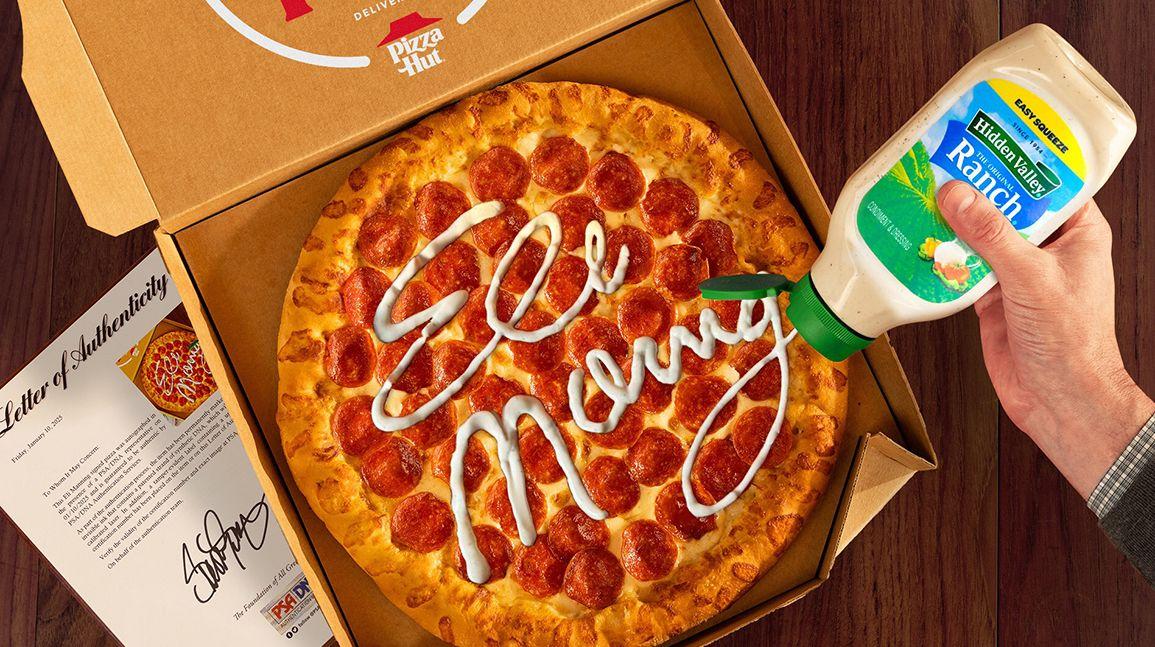 Eli Manning-signed pizza offered as contest prize