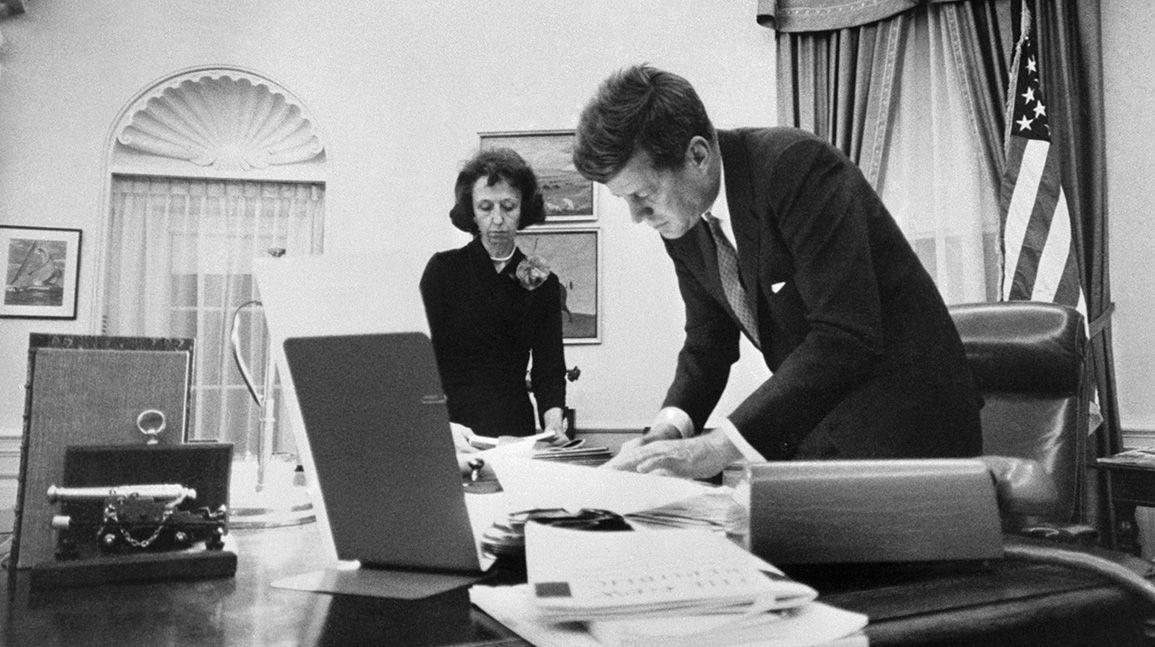 What's the better deal: Comparing two signed JFK items