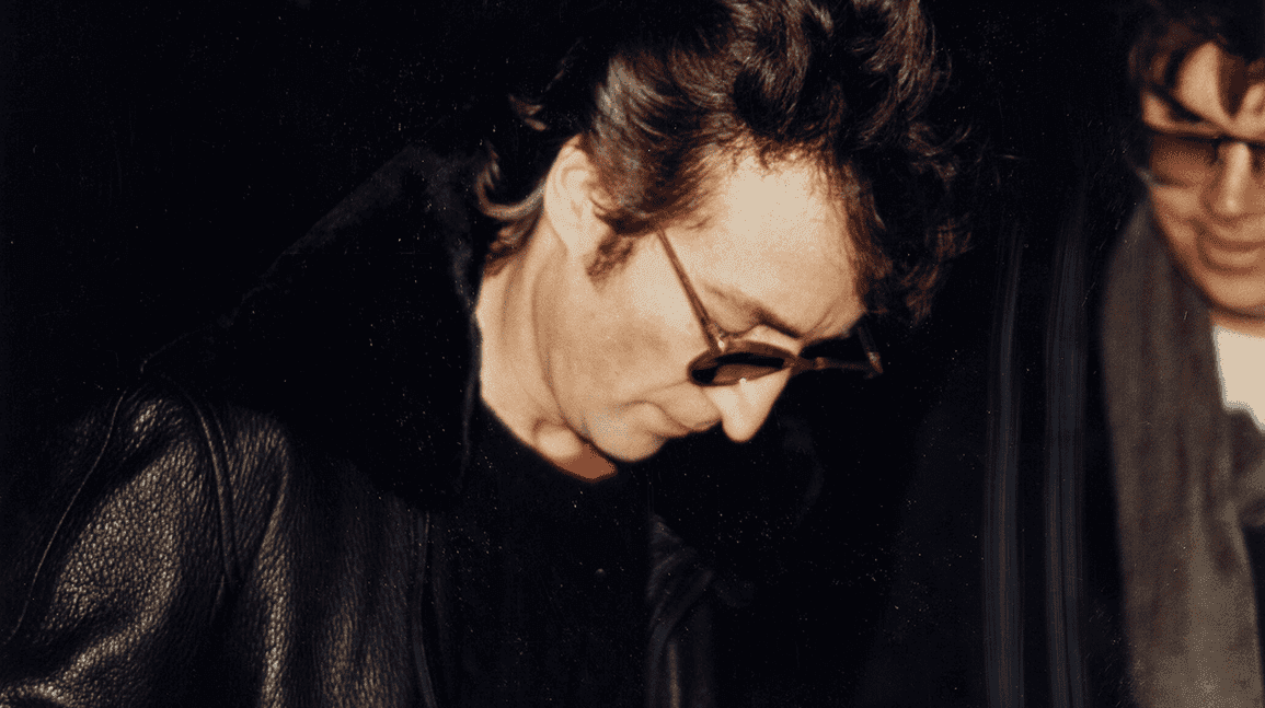 Cover Image for Type 1 photo of John Lennon with his killer sells for $14,375