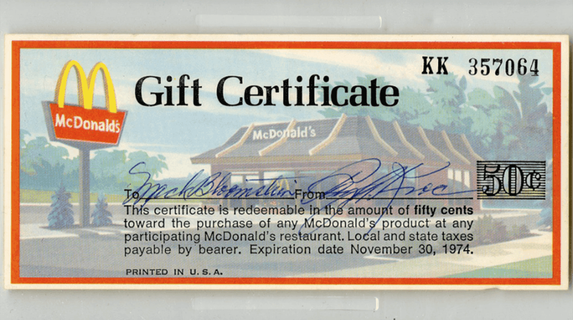 Cover Image for McDonald's 50-cent gift certificate, signed by Ray Kroc, sells for $2,200