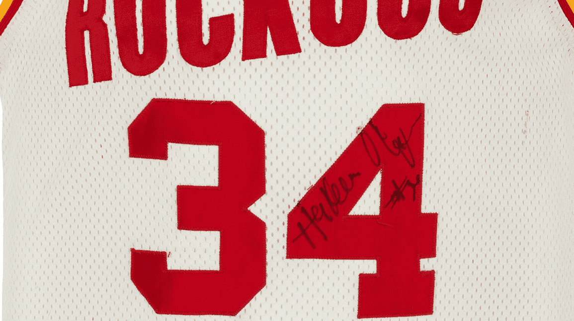 Cover Image for Hakeem Olajuwon-signed 'Draft Day' jersey to sell at auction
